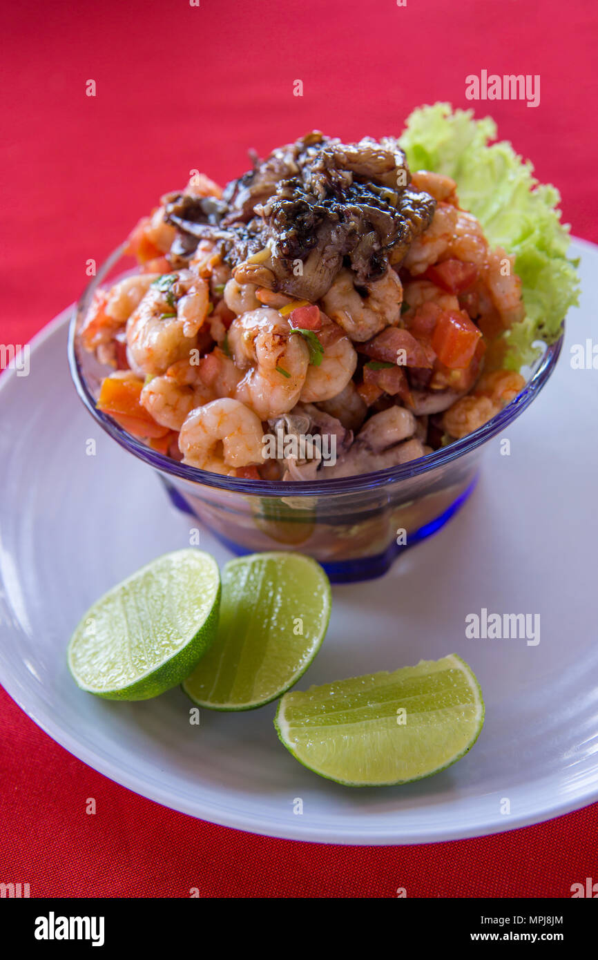 Seafood ceviche, typical dish from central america, mexico, peru. With prawns and mussels and lime. Stock Photo