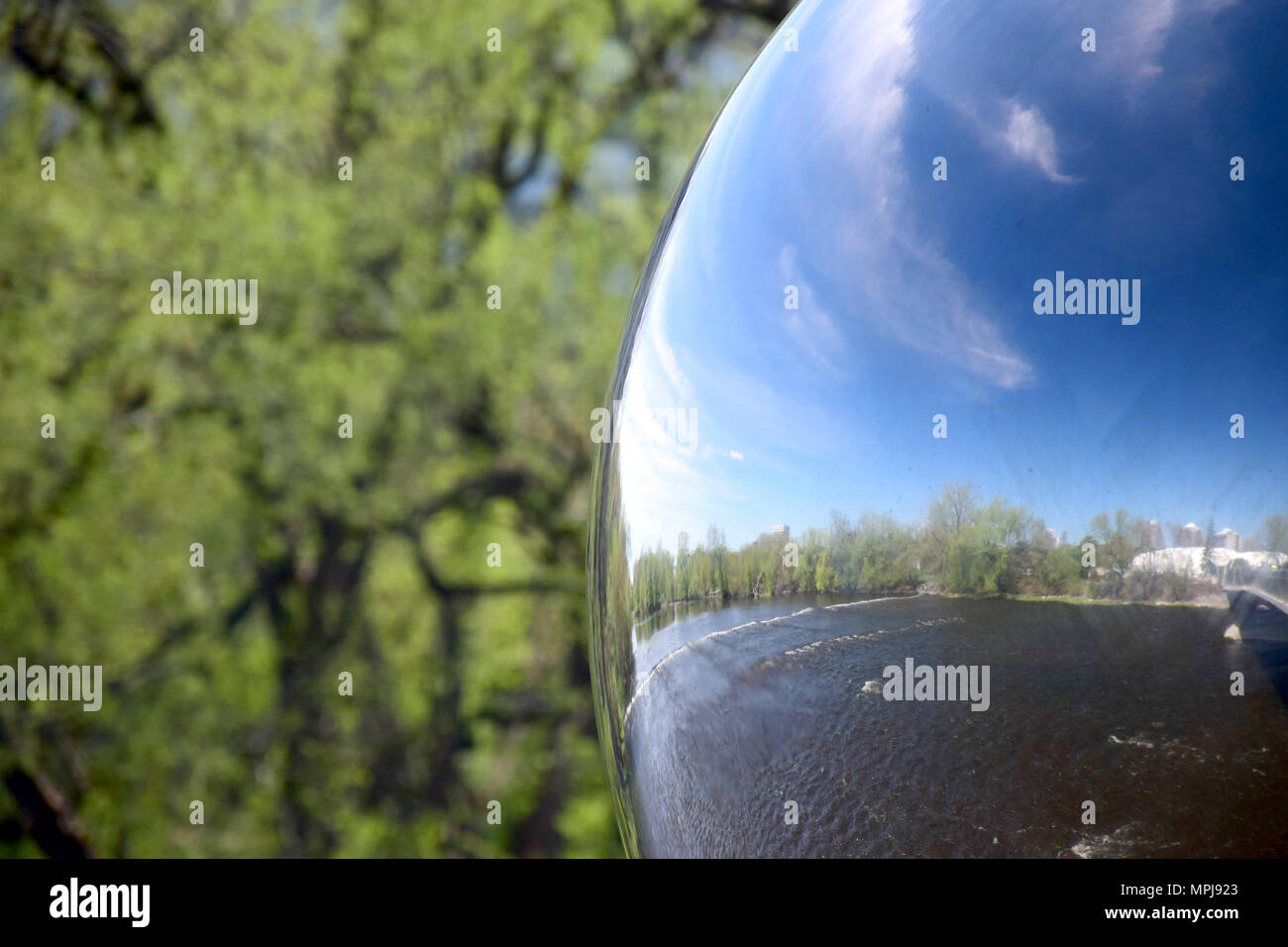 Reflection on a metal sphere Stock Photo