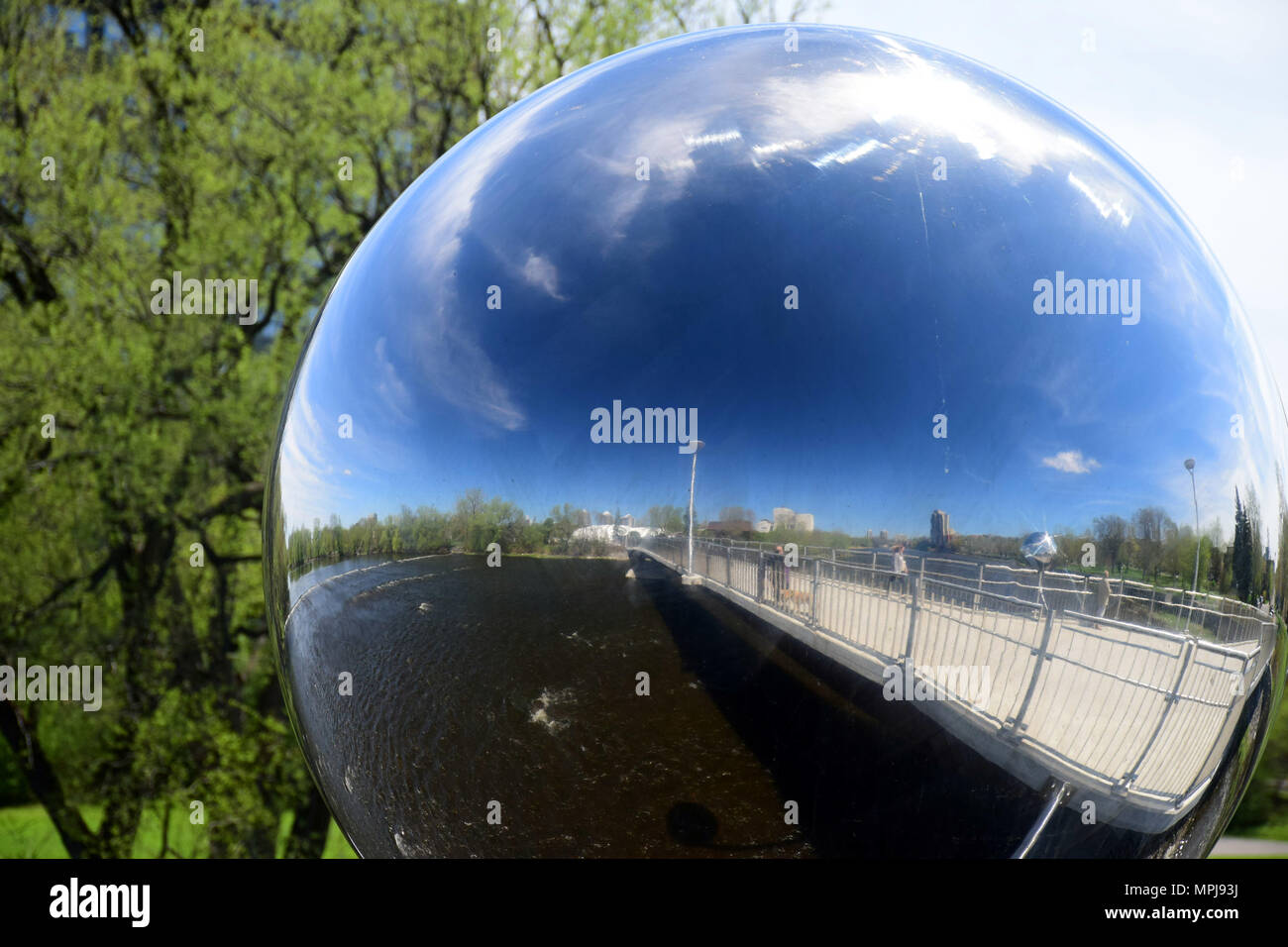 Reflection on a metal sphere Stock Photo