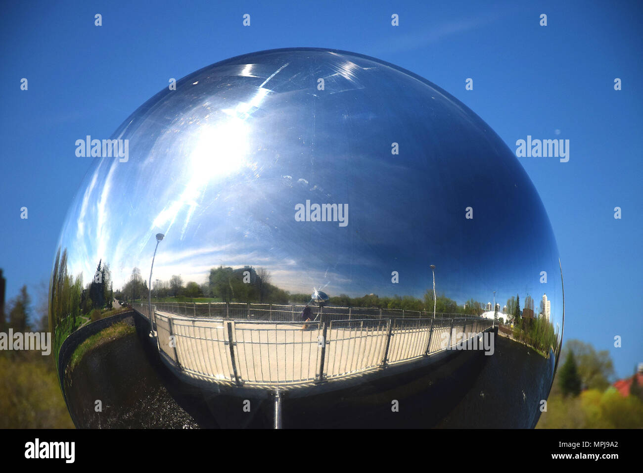 Reflection on a metal sphere Stock Photo