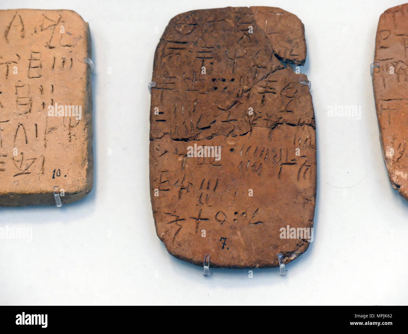 CRETE Clay tablets with Linear B script in Heraklion Museum. Photo: Tony Gale Stock Photo