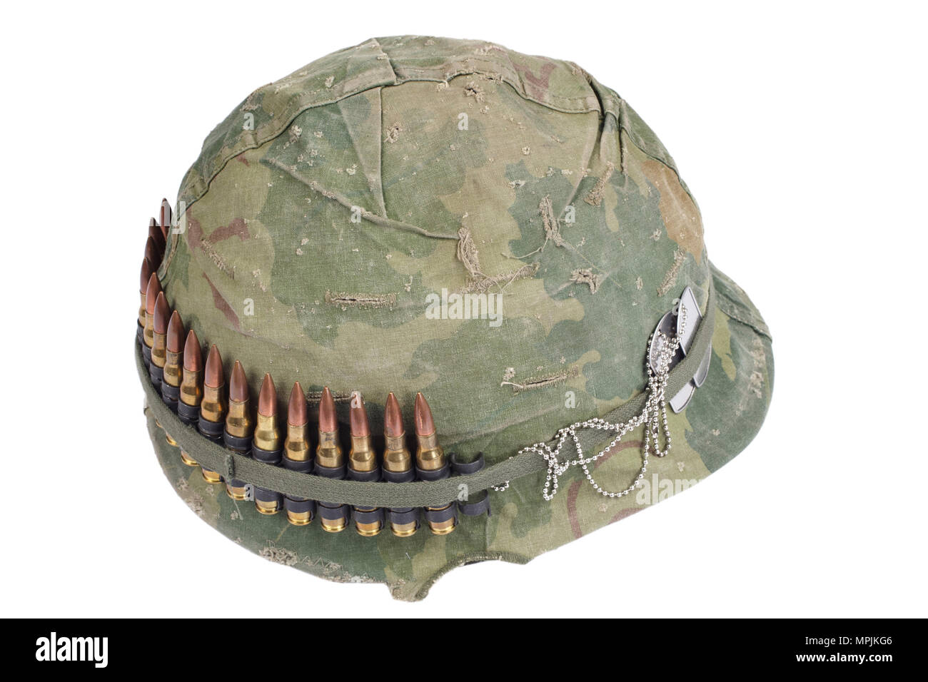 US Army helmet with camouflage cover and ammo belt and dog tags