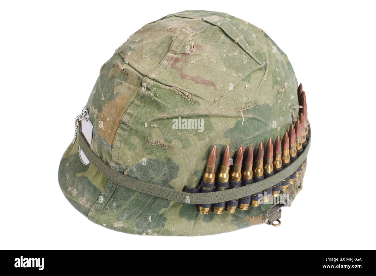 US Army helmet with camouflage cover and ammo belt and dog tags