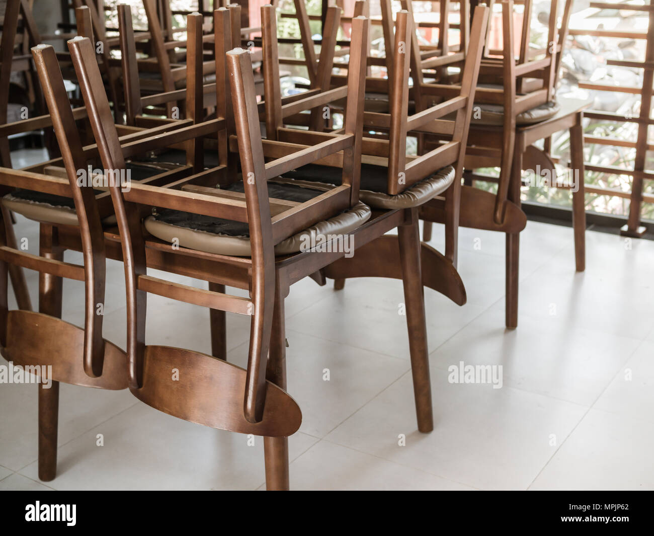 Put Chairs On Tables At Declan Newling Blog