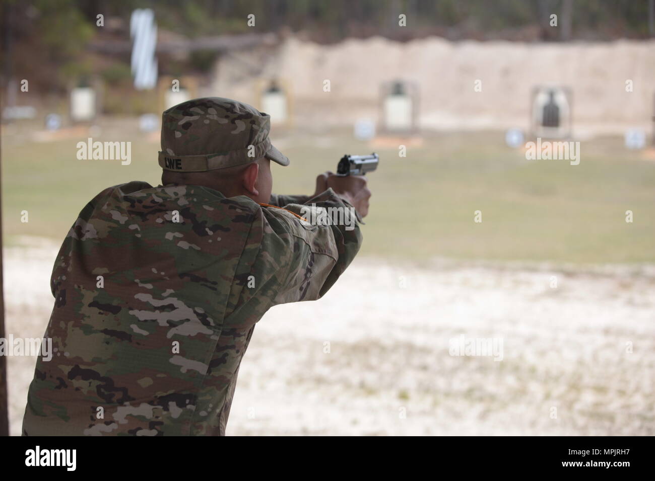 U.S. Army 2nd Lieutenant Daniel Lwe, attached to the 982D Combat Camera Company (Airborne), qualifies with the 9M at a range on Fort Jackson, S.C., March 18, 2017. The 982nd Combat Camera Company (Airborne) is one of only two combat camera companies in the U.S. Army tasked with providing the Office of the Secretary of Defense, Chairman of the Joint Chiefs of Staff, and the military departments with a directed imagery capability in support of operational and planning requirements through the full range of military operations. (U.S. Army Photo by SPC Kristen Dobson) Stock Photo