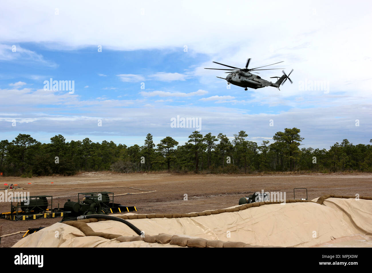 A U.S. Marine Corps CH53E Super Stallion prepares to land