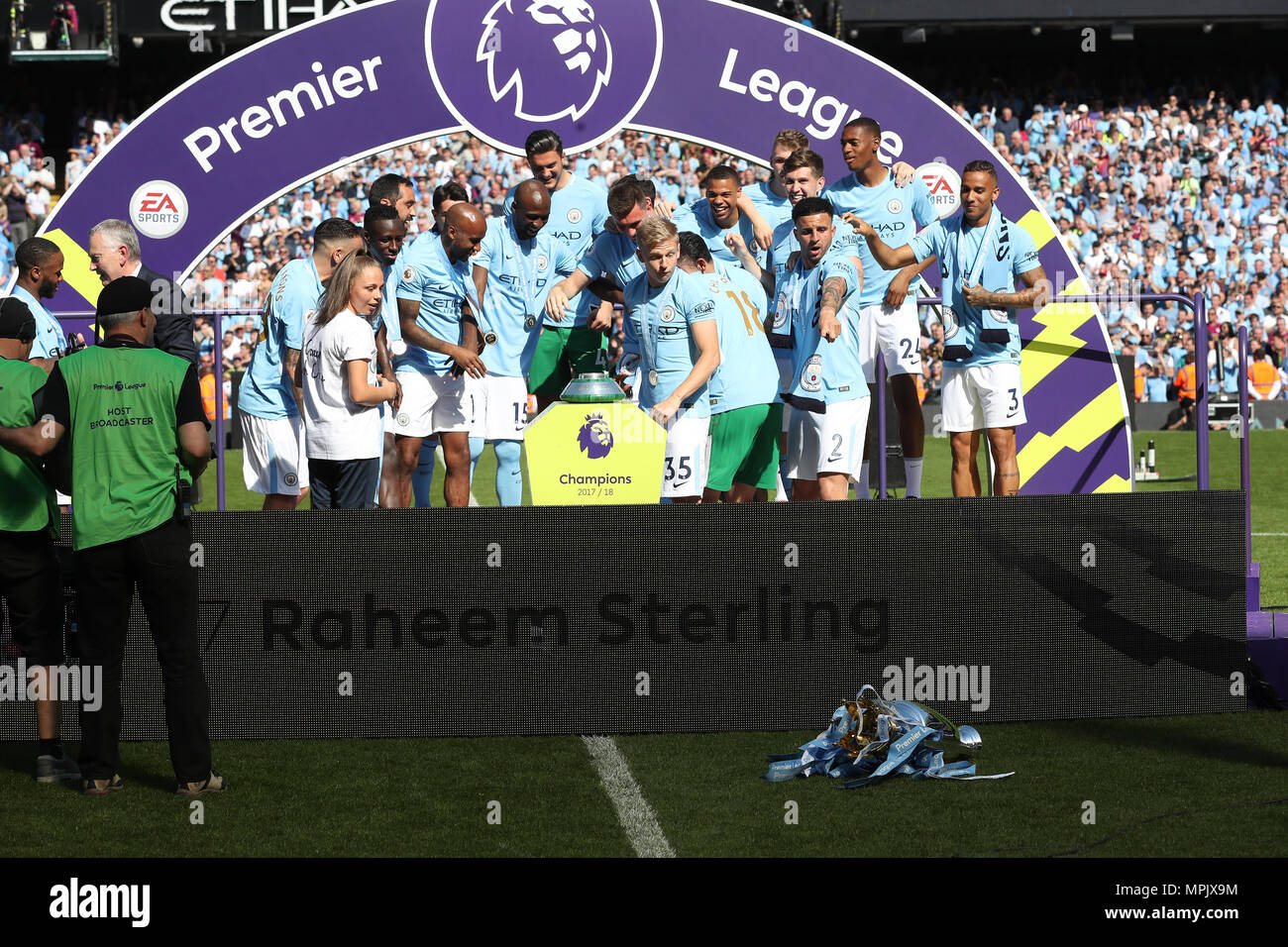 The Premier League trophy takes a tumble as Manchester City's Alexander