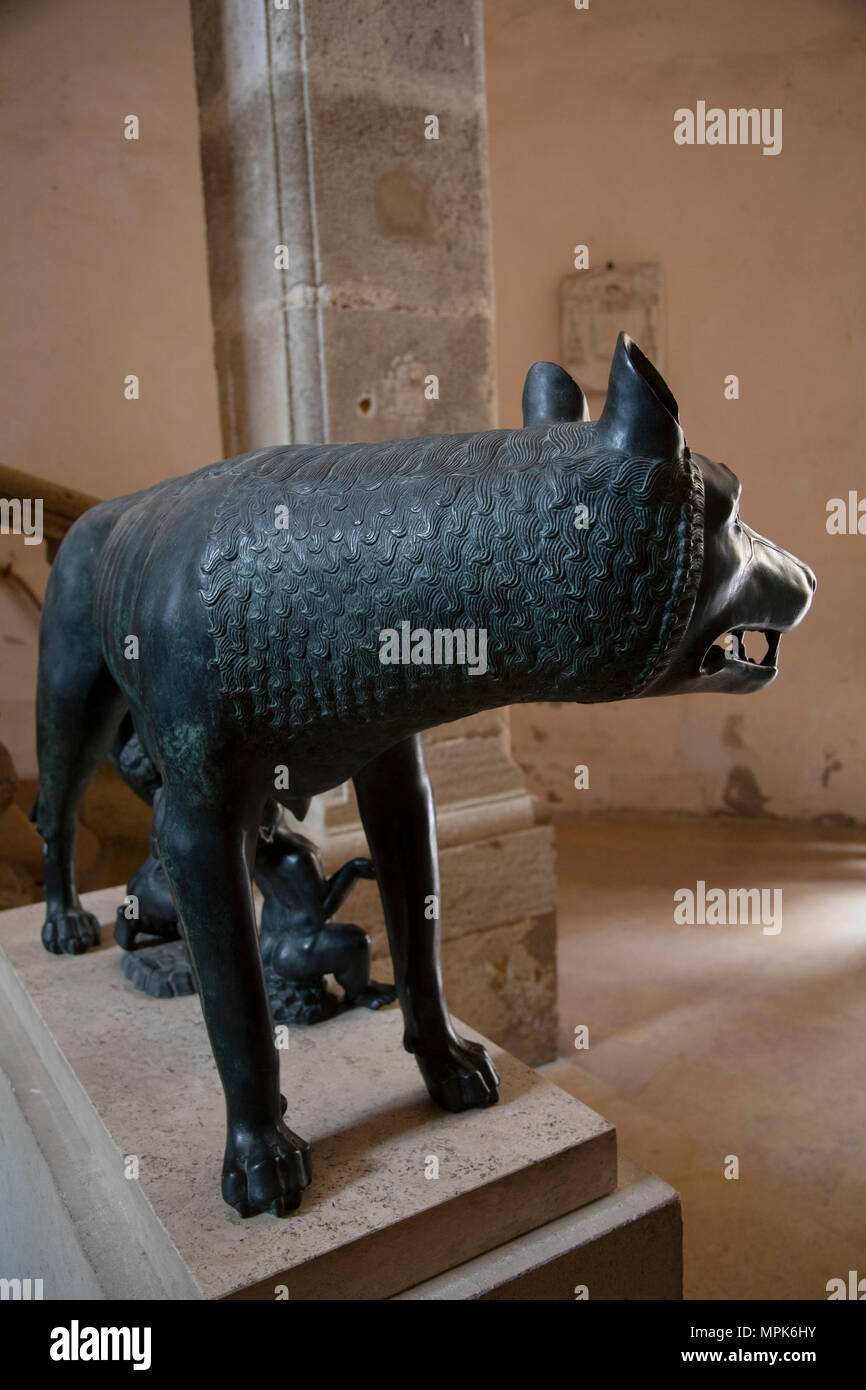 Capitoline Wolf suckling the twins Romulus and Remus in Narbonne, France. This is a symbol of Rome. The statue was favoured by Italian dictator Benito Mussolini, who donated copies of the statues to various places around the world. Stock Photo