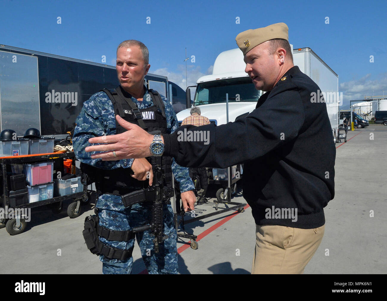170323-N-IE405-013 SAN DIEGO (March 23, 2017) Naval Base San Diego Command Master Chief Matt Ruane explains the history of the California naval base to actor Adam Baldwin prior to the filming of the television show 'The Last Ship'. (U.S. Navy photo by Mass Communication Specialist 2nd Class Indra Bosko/Released) Stock Photo