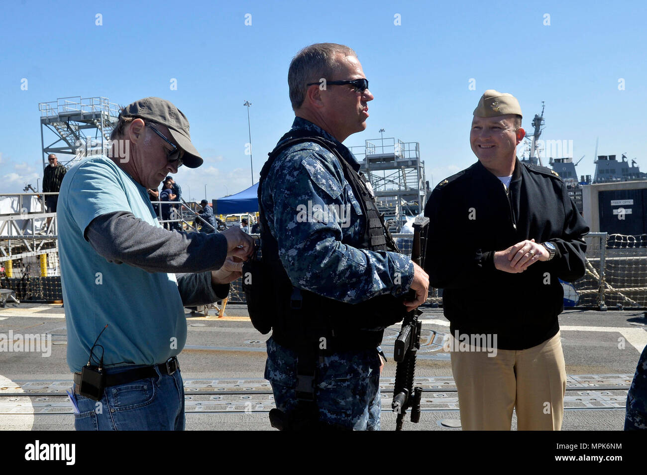 170323-N-IE405-230 SAN DIEGO (March 23, 2017) Naval Base San Diego Command Master Chief Matt Ruane explains the history of the California naval base to actor Adam Baldwin prior to the filming of the television show 'The Last Ship'. (U.S. Navy photo by Mass Communication Specialist 2nd Class Indra Bosko/Released) Stock Photo
