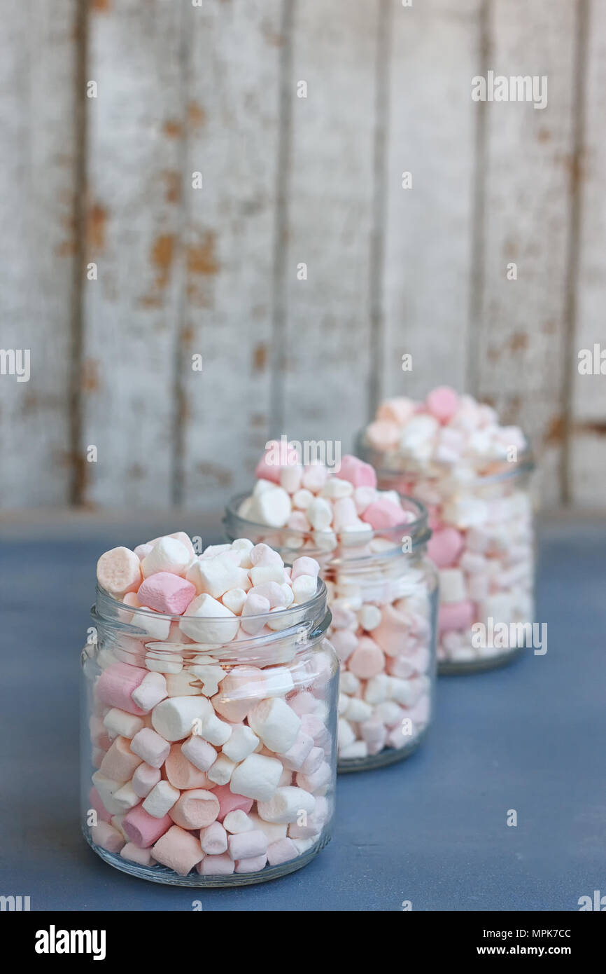 Three glass jars filled to the brim marshmallow Stock Photo Alamy