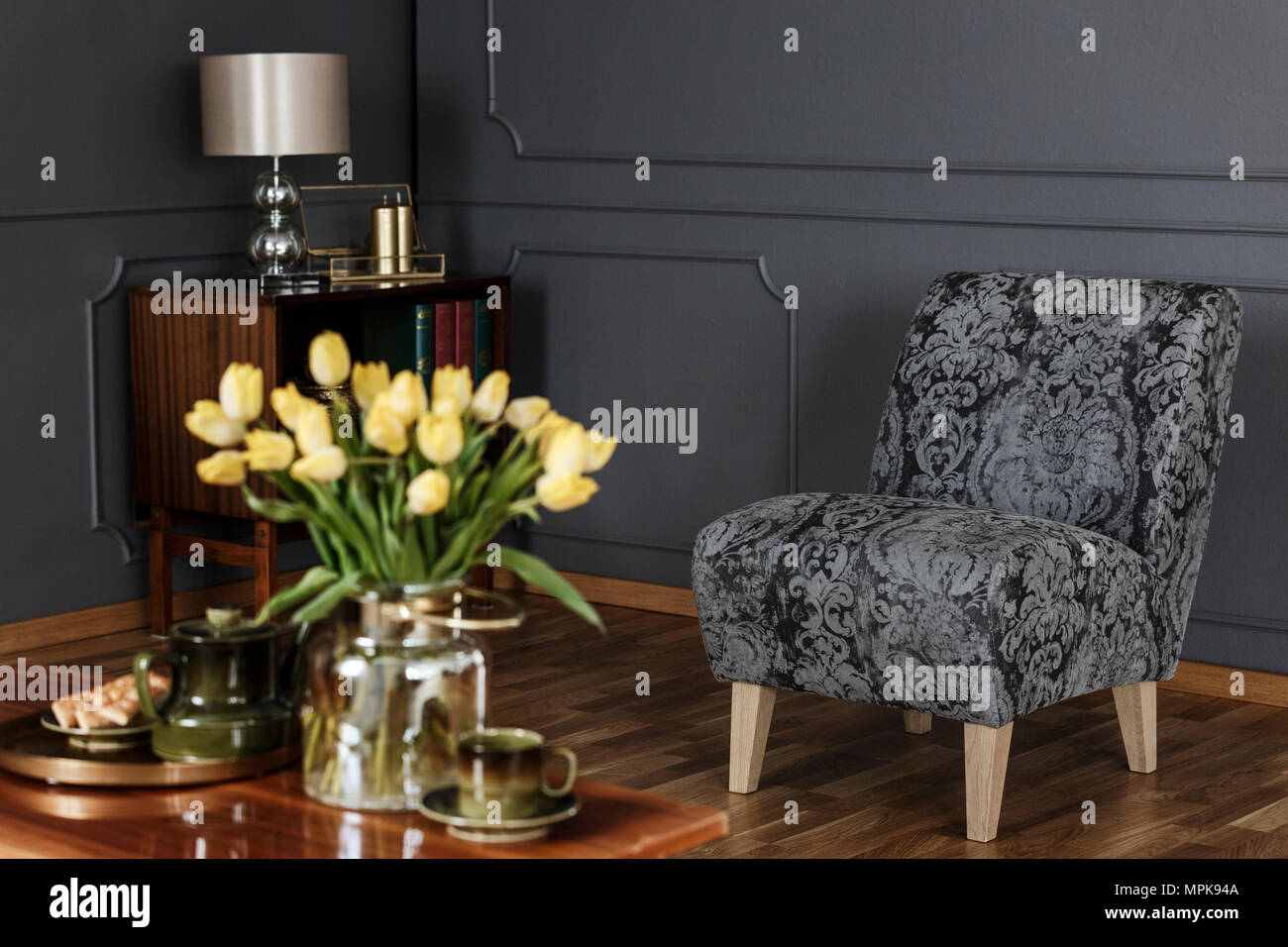 yellow patterned armchair