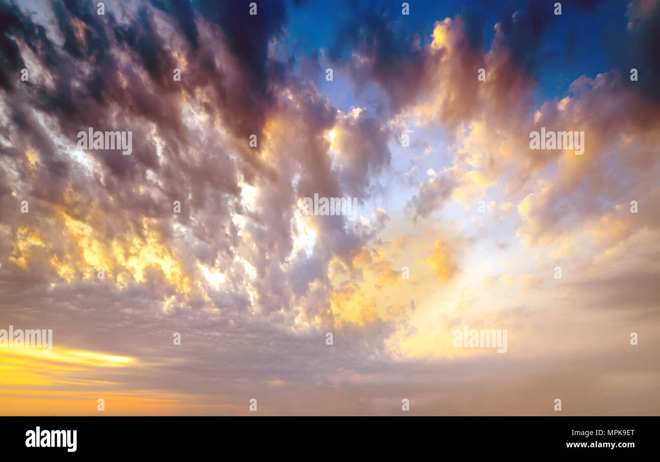 Sunset / sunrise with clouds, light rays and other atmospheric effect ...