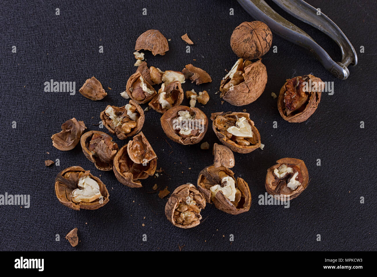 Greek nuts whole and split and the Nutcracker Stock Photo Alamy