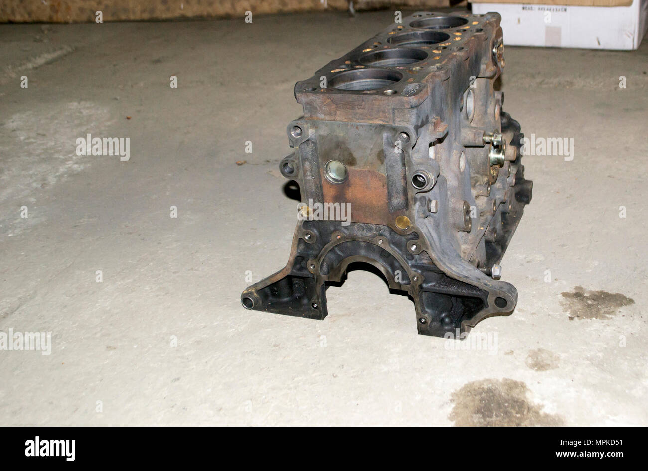 Disassembled diesel engine for repair. The cylinder block is clean. Stock Photo