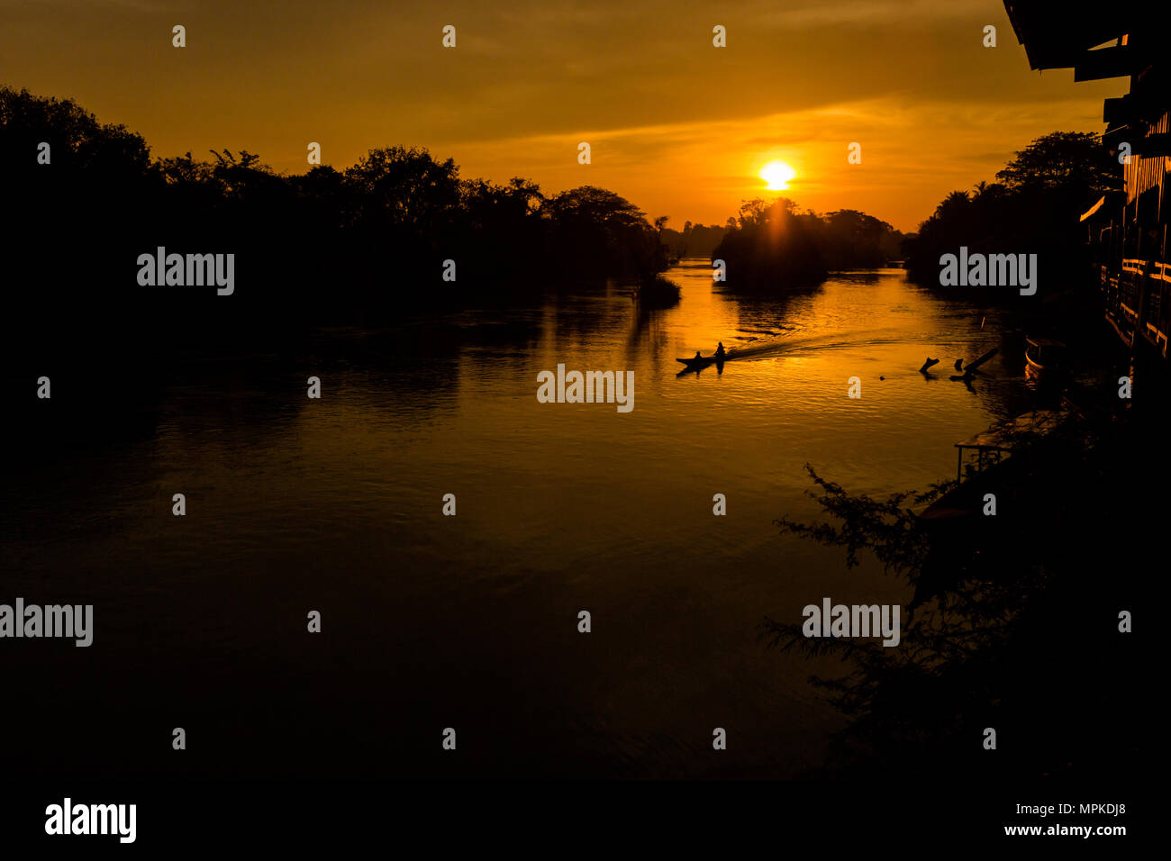 Beautiful golden sunrise on Don Det in south Laos. Landscape of nature taken on four thousands islands Si Phan Don on Mekhong river in south east asia Stock Photo