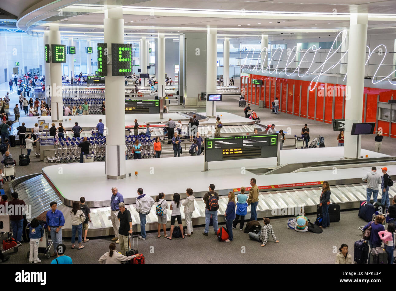 Canada,Canadian,North America Ontario Province,Toronto,Pearson International Airport,terminal,baggage claim,luggage,suitcase,baggage,arriving passenge Stock Photo