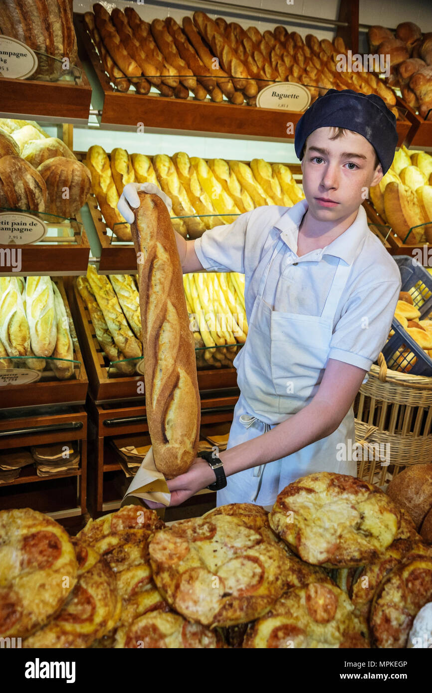 Montreal Canada,Quebec Province,Atwater Market,rue Saint Ambroise,Boulangerie Premiere Moisson,bakery,bread,teen teens teenager teenagers boy boys mal Stock Photo