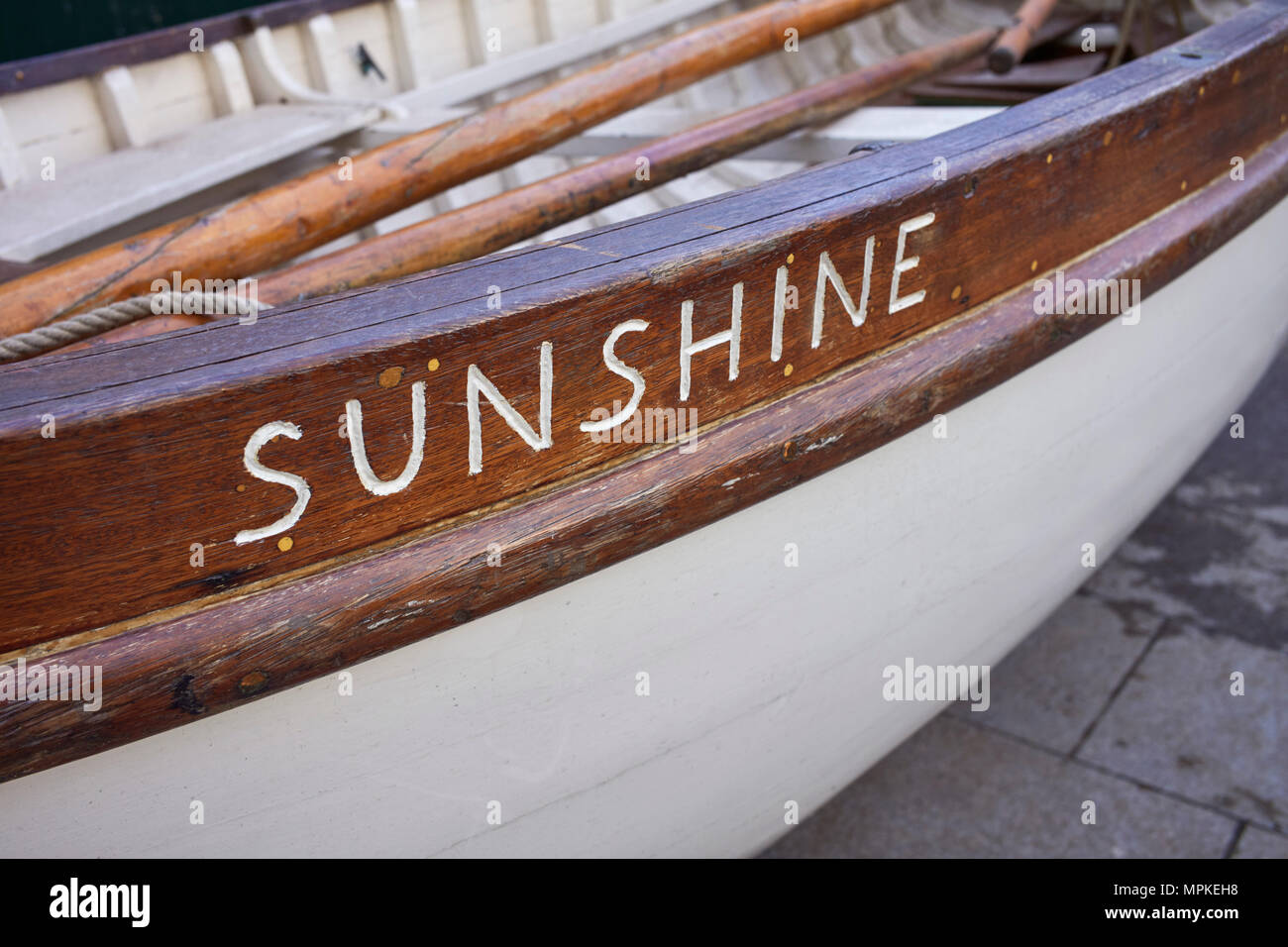 Thames skiff boat Sunshine showing the carved in lettering Stock Photo