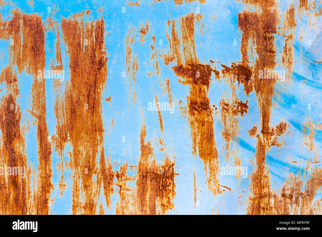 Old painted metal texture with traces of rust and cracks Stock Photo