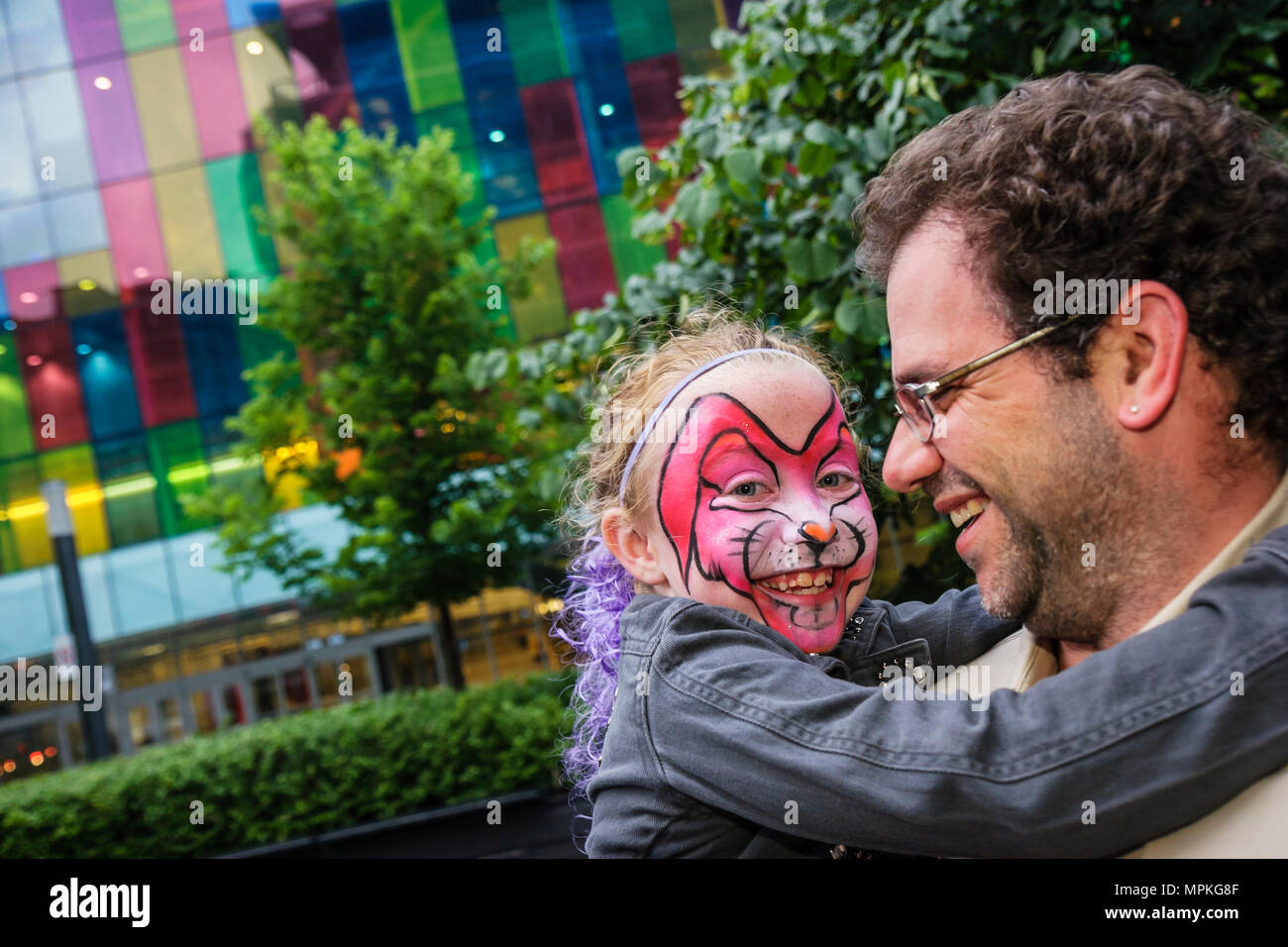 Montreal Canada,Quebec Province,Palais de Congrès,Convention Centre,Jean Paul Riopelle Square,smiling girl,girls,child,painted face painting,father,pa Stock Photo