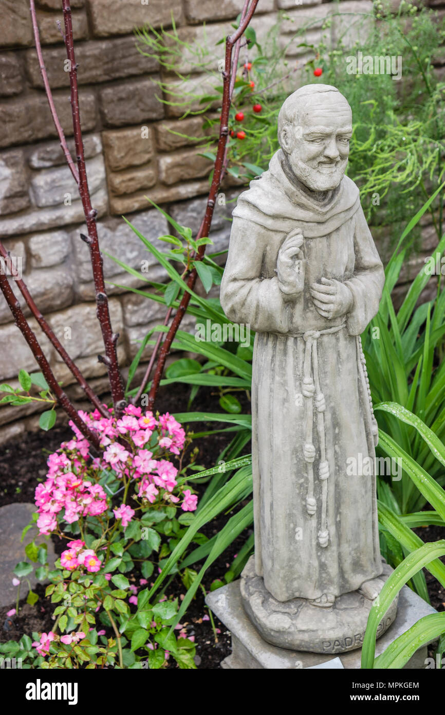 Montreal Canada,Quebec Province,International Flora Montreal Garden Festival,festivals fair,botanical,flower,flower,plants,monk statuette,Canada070705 Stock Photo