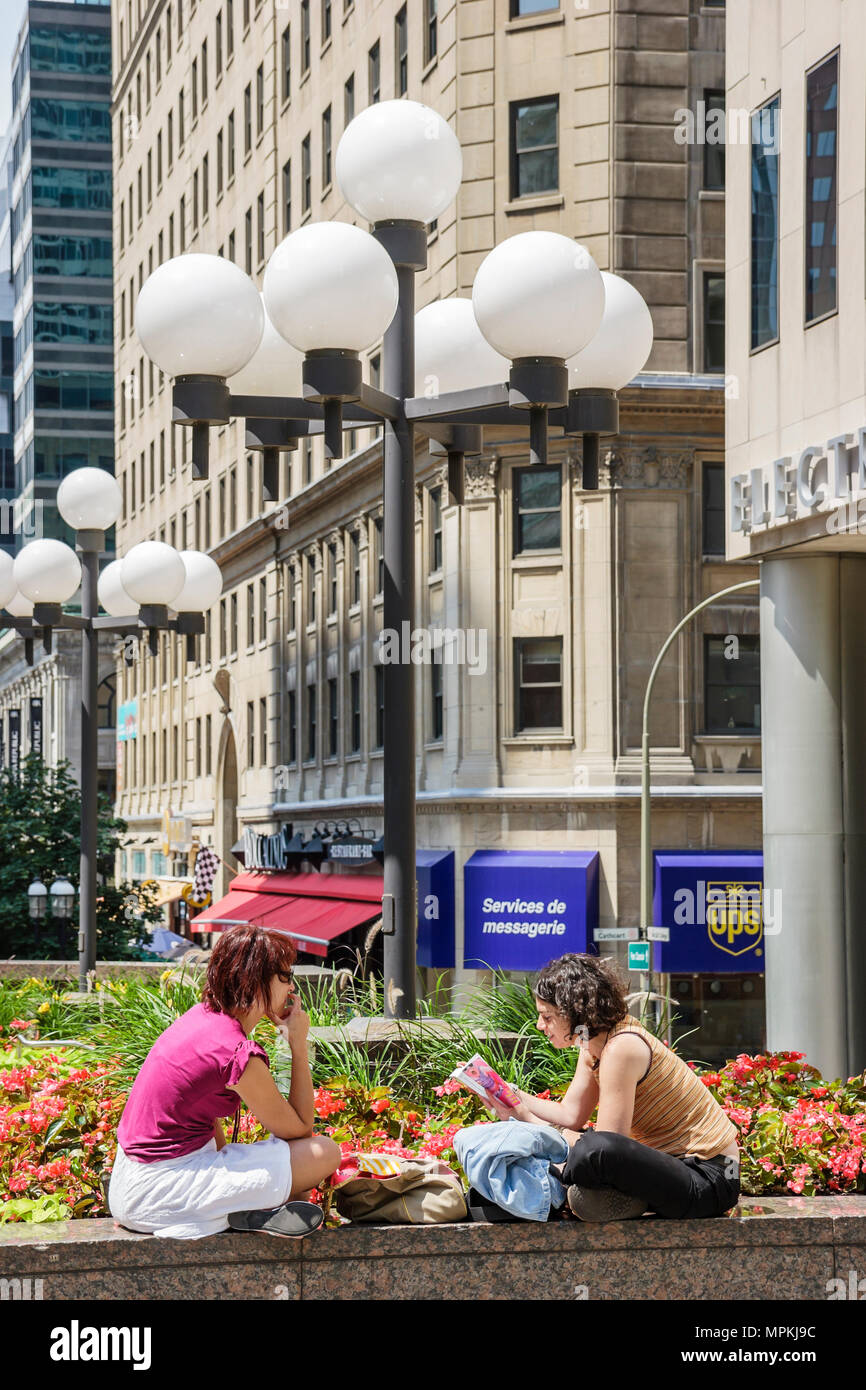 Montreal Canada,Quebec Province,Avenue McGill College,school,campus,Place Ville Marie,women,lunchtime,urban park,office buildings,city skyline,Canada0 Stock Photo