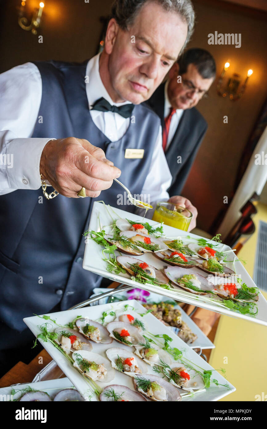 Montreal Canada,Quebec Province,Fairmont Queen Elizabeth,hotel,man men male,waiter waiters server employee worker workers working staff,hors d'oeuvres Stock Photo