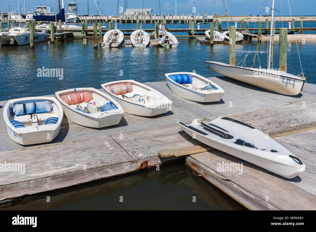 Pram sailboats on the dock at the Gulfport Yacht Club in Gulfport, Mississippi Stock Photo