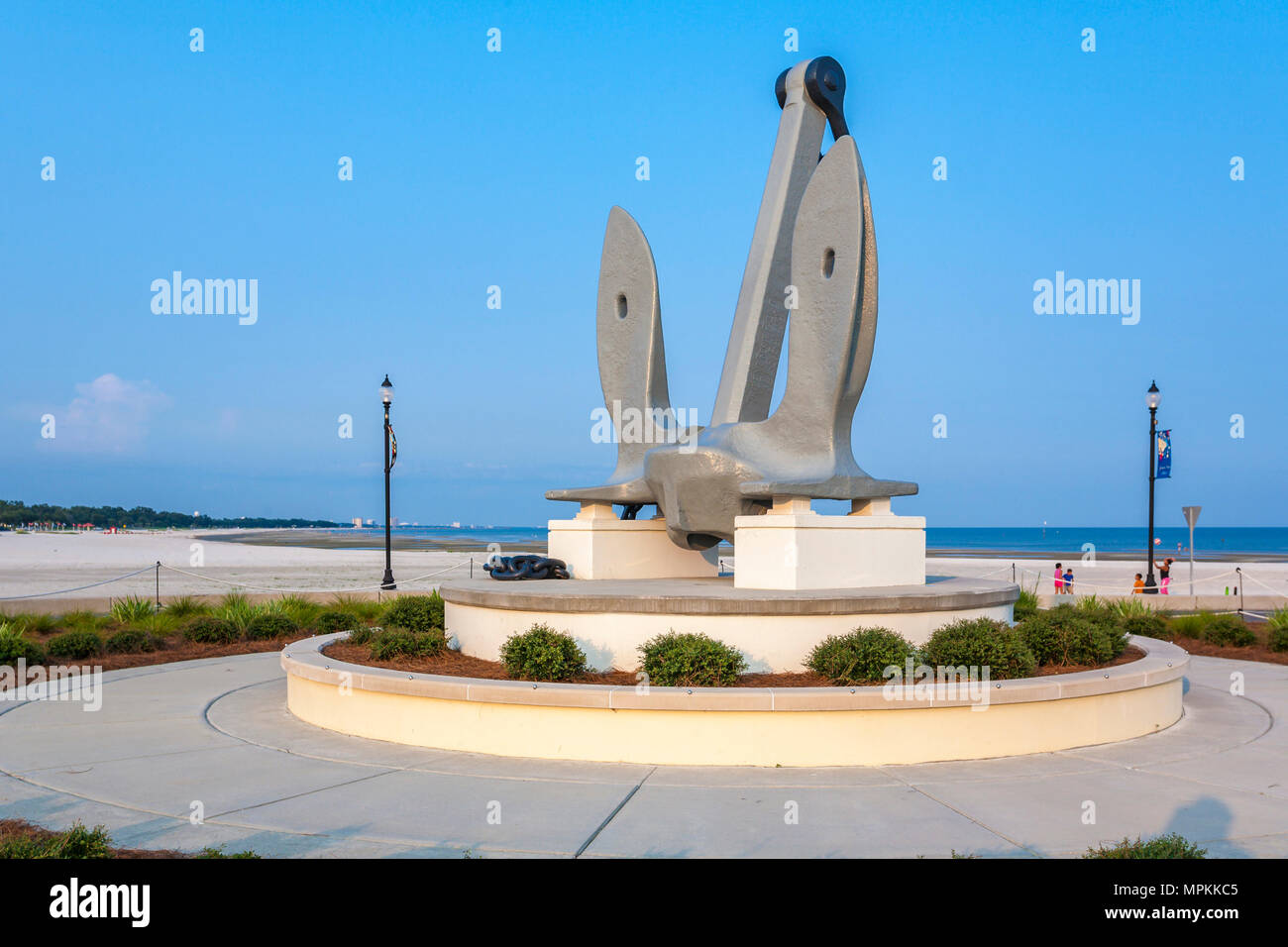 Large anchor at the center of a traffic roundabout in Jones park at the