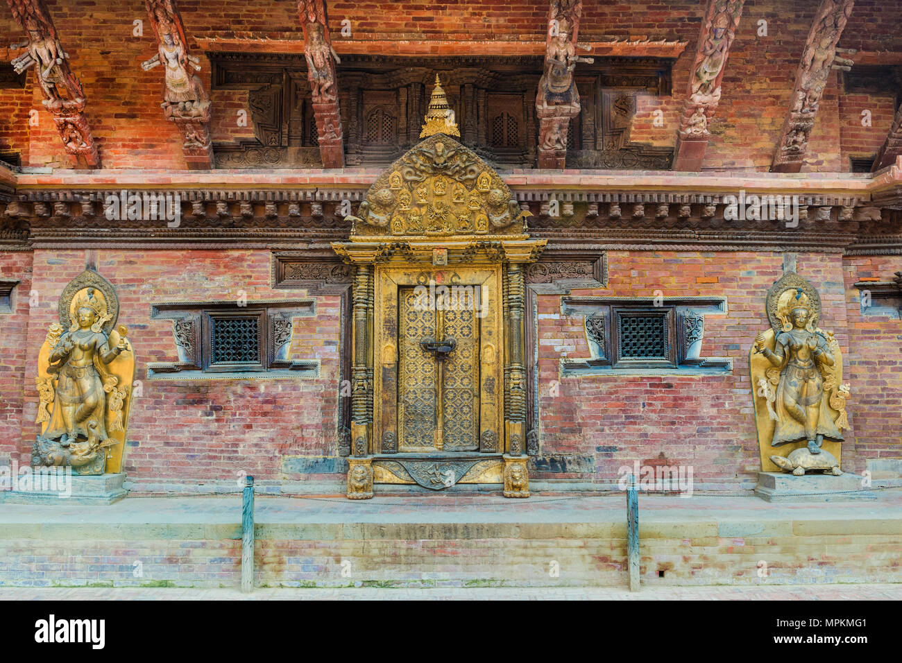 Ganga river Goddess statue on both sides of the Golden Doorway, Mul Chowk, Hanuman Dhoka Royal Palace, Patan Durbar Square, Unesco World Heritage Site Stock Photo