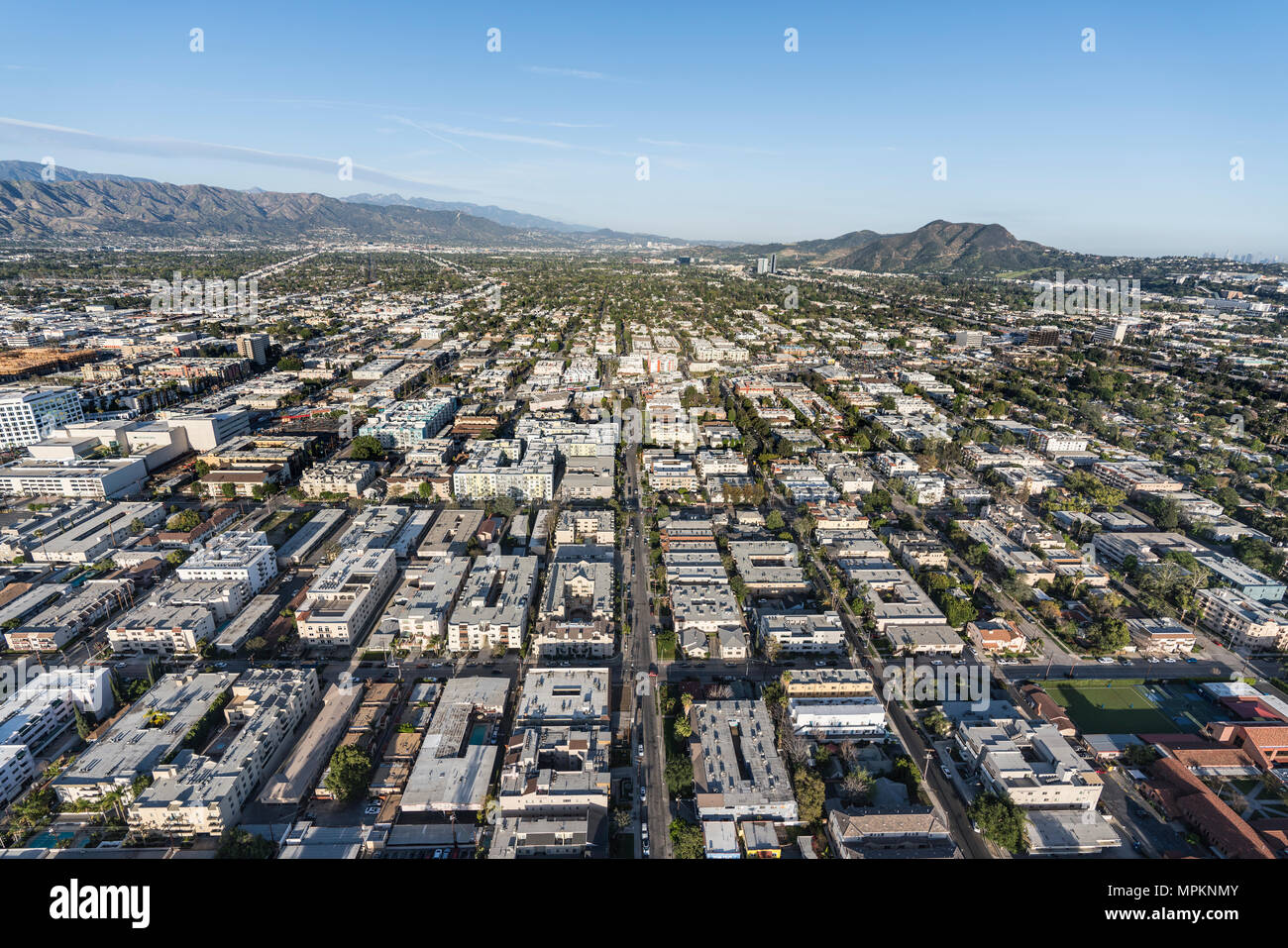 Aerial view of San Fernando Valley homes, apartments and streets in the North Hollywood neighborhood of Los Angeles, California. Stock Photo