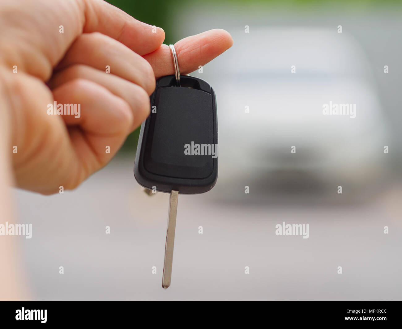 Women S Hand Presses On The Remote Control Car Alarm Systems Stock Photo Alamy