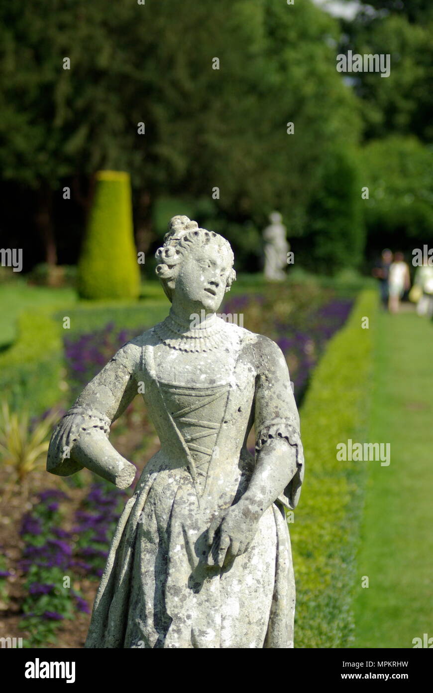 Stone statue of a woman in the garden of Cliveden House, Berkshire, England Stock Photo