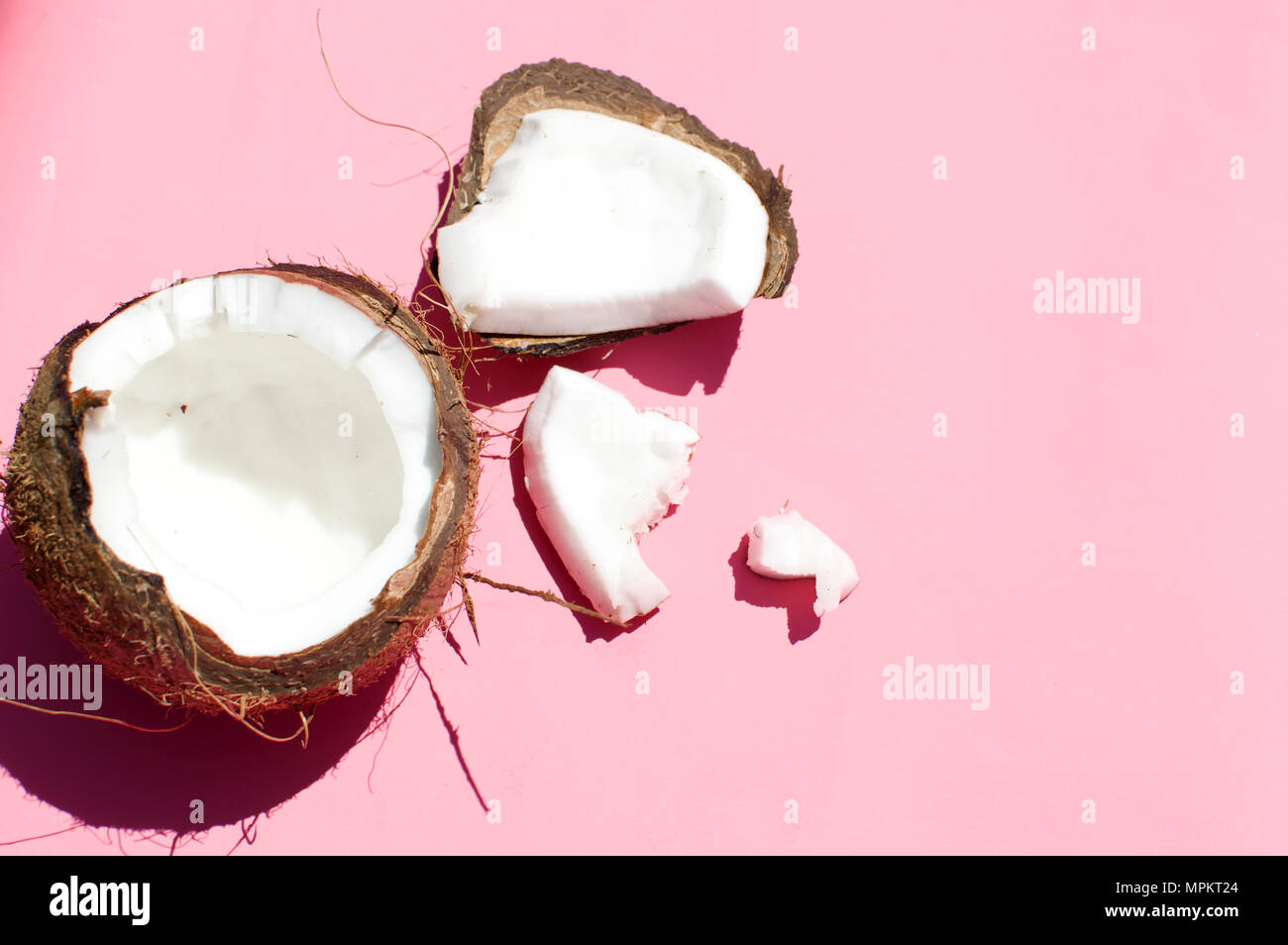 coconut on pink background Stock Photo