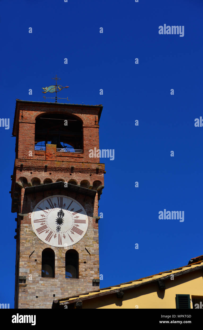 Lucca medieval 'Torre delle Ore' (Clock Tower), in city historic center (with copy space) Stock Photo