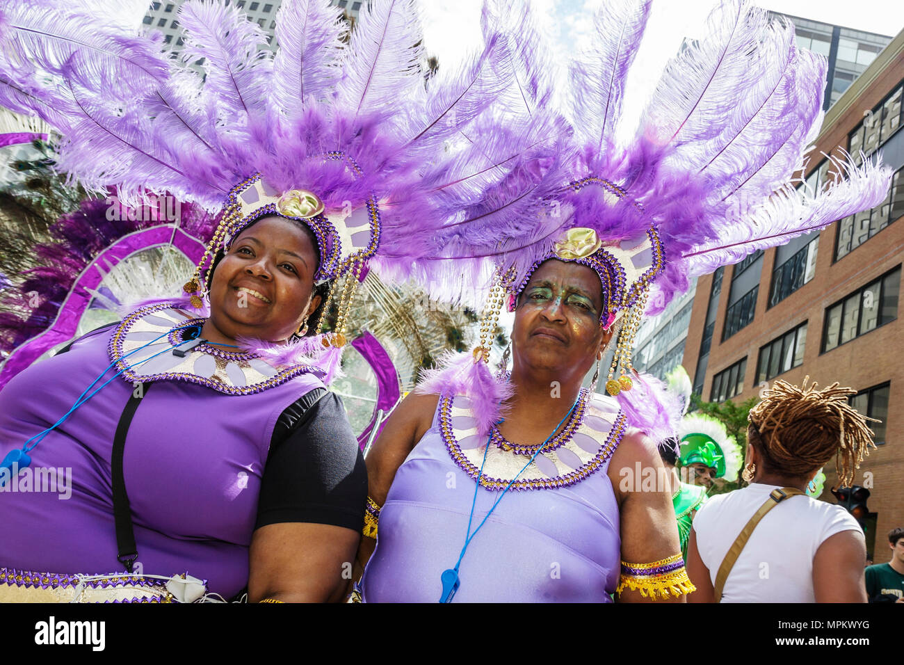 Montreal Canada,Quebec Province,Boulevard Rene Levesque,Carifiesta,Mardi Gras style Caribbean parade,costume,Black women,celebration,visitors travel t Stock Photo