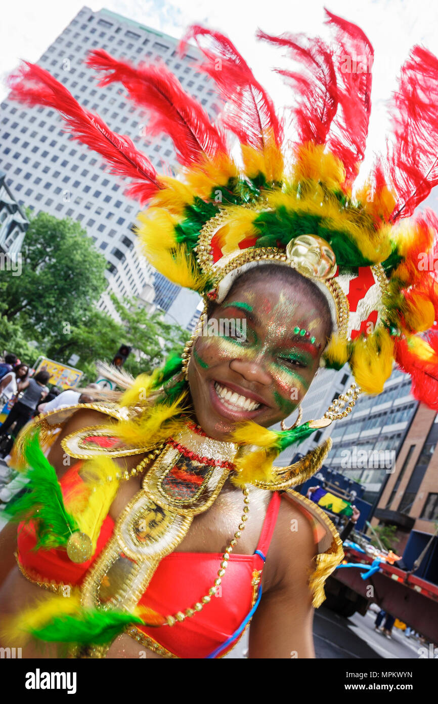 Montreal Canada,Quebec Province,Boulevard Rene Levesque,Carifiesta,Mardi Gras style Caribbean parade,costume,smiling Black teen,teenager,teenagers,gir Stock Photo