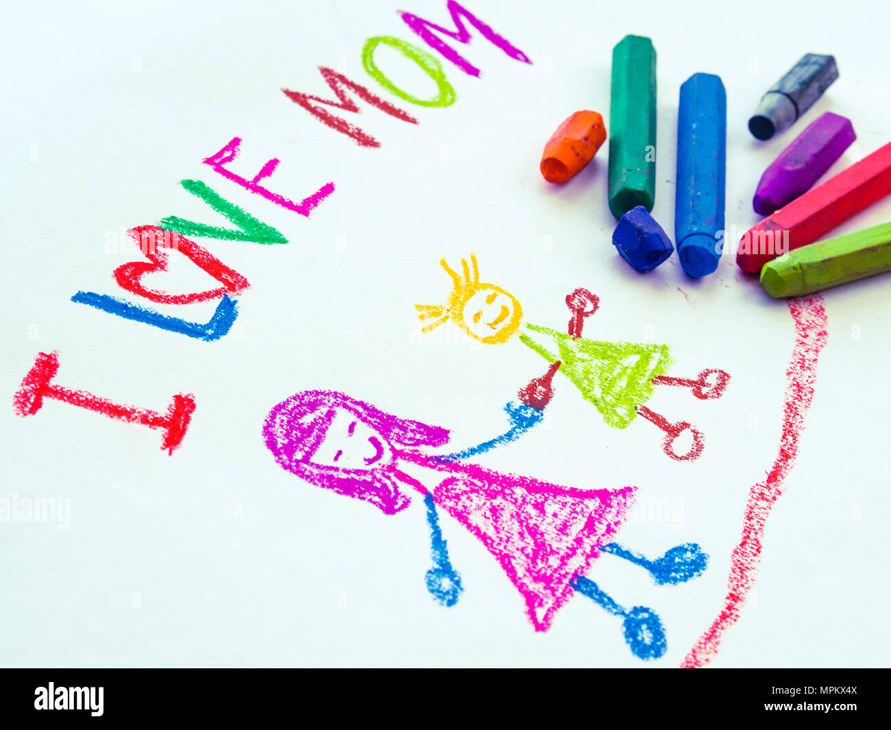 Kid drawing of mother holding her daughter for happy mother's day theme Stock Photo