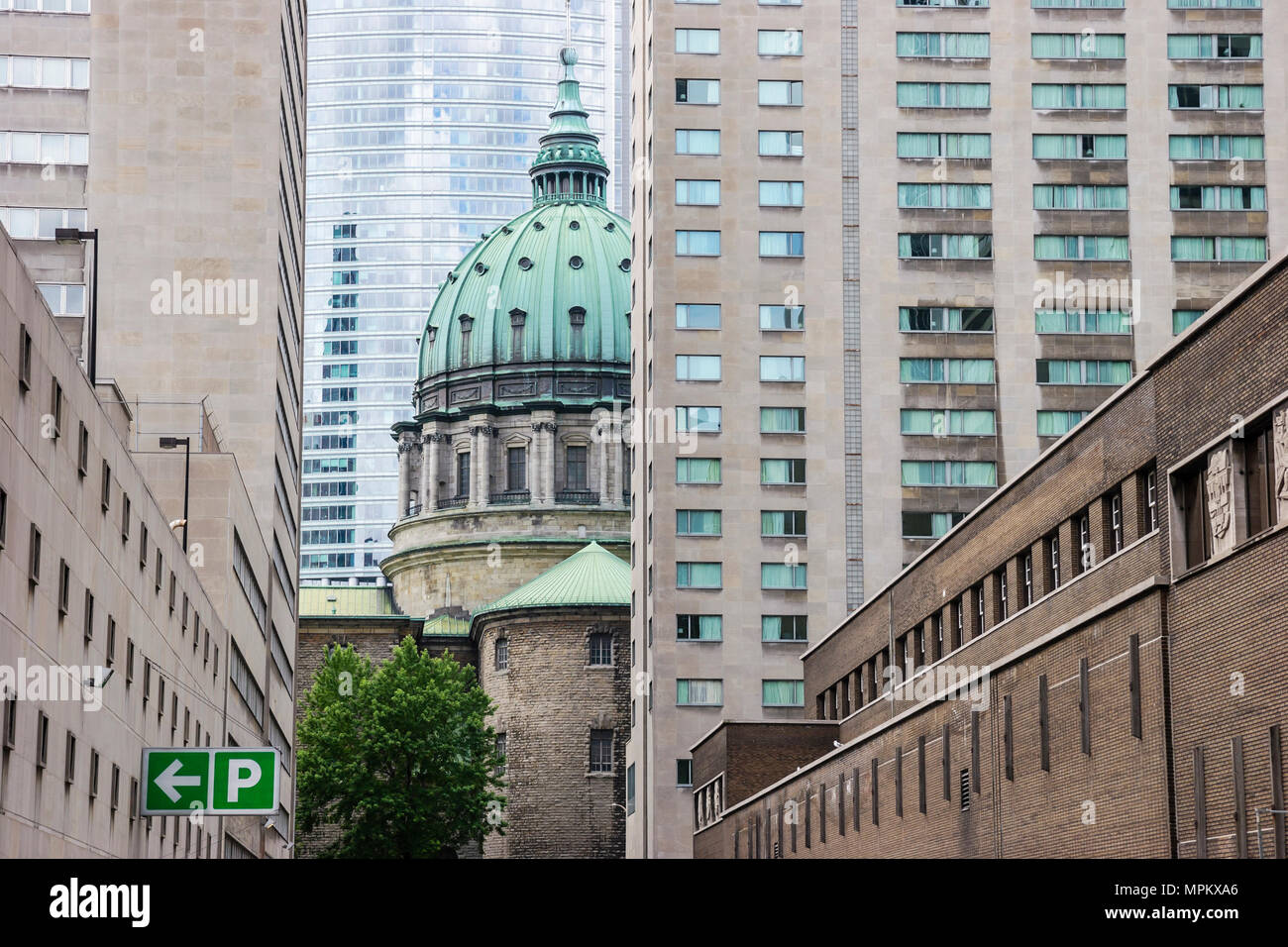 Montreal Canada,Quebec Province,Rue Belmont,Cathedrale Marie Reine du Monde,cathedral,church,hotel,office building,Canada070708019 Stock Photo