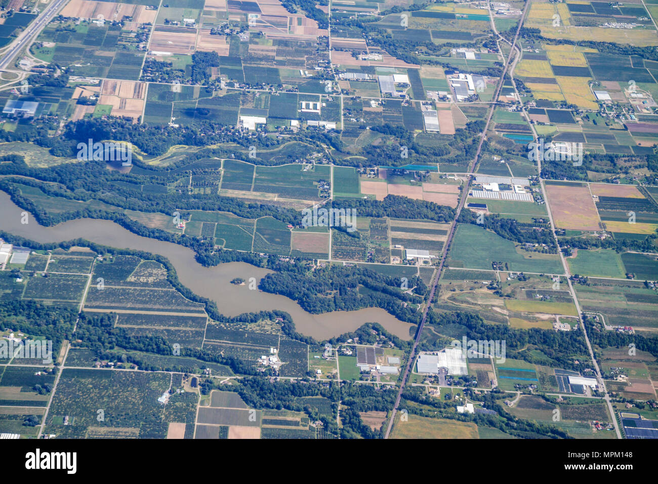 Canada,St. Catharines,approaching Toronto Lester B. Pearson International Airport,YYZ,aerial overhead view from above,farmland,Sixteen Mile Pond,land, Stock Photo