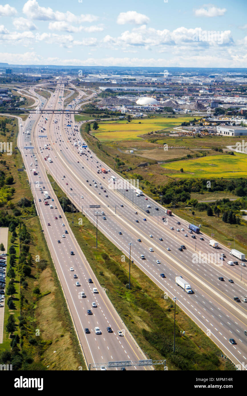 Toronto Canada,approaching Lester B. Pearson International Airport,YYZ,aerial overhead view from above,MacDonald Cartier Freeway,highway,road,lane,lin Stock Photo
