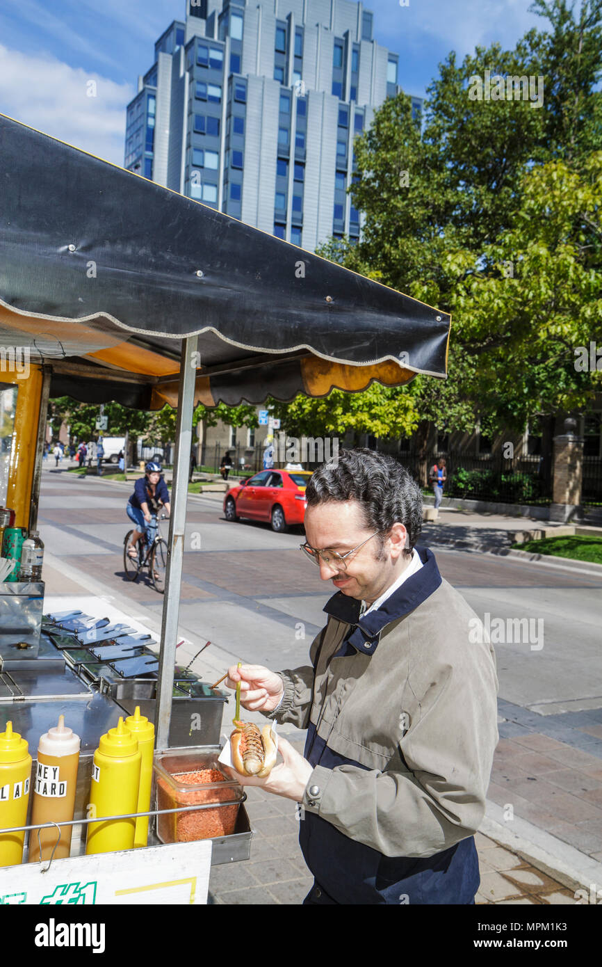 Toronto Canada,University of Toronto,St. George Street,campus,higher learning,education,public university,street food,vendor vendors stall stalls boot Stock Photo