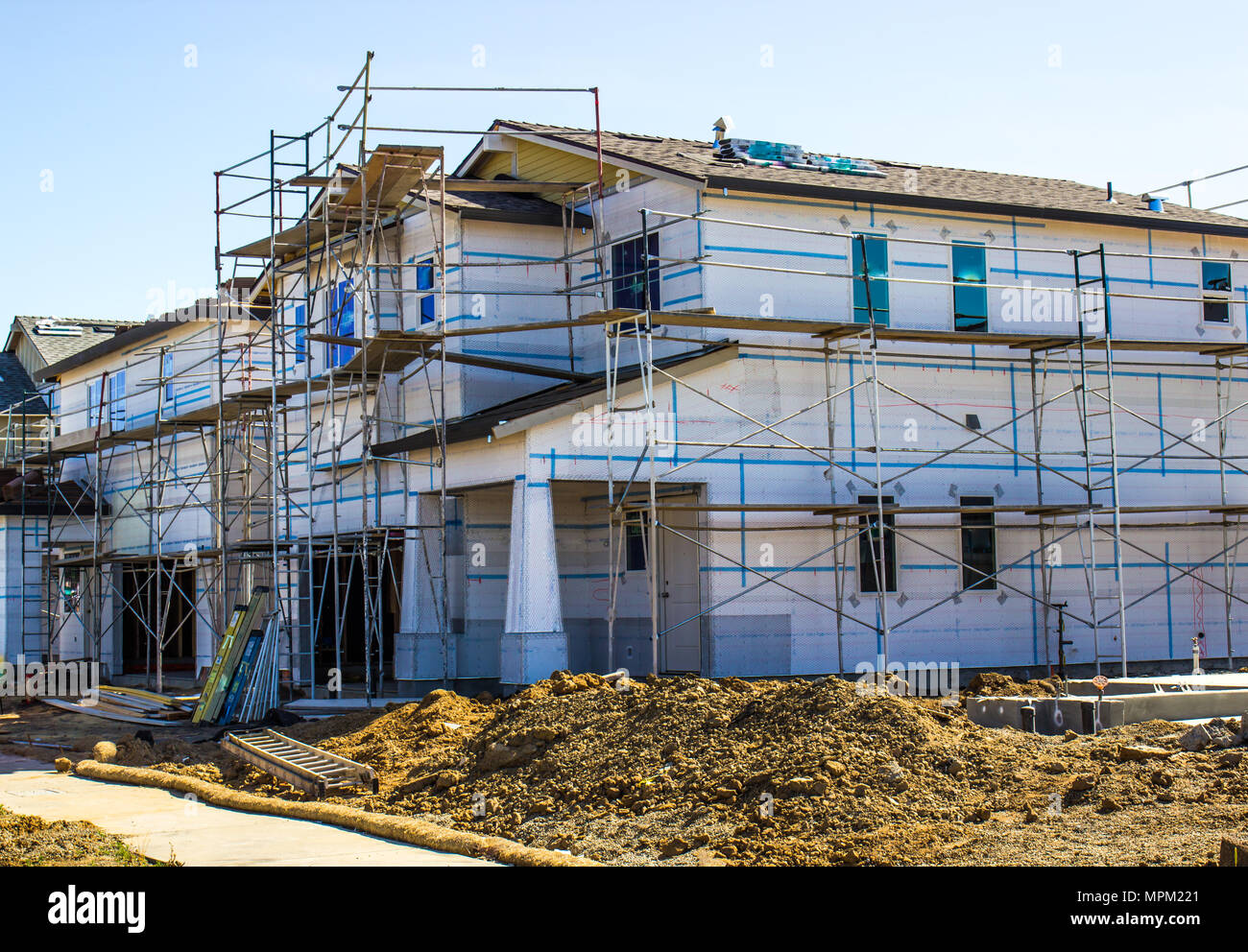 New Two Story Home Construction With Scaffolding Stock Photo Alamy