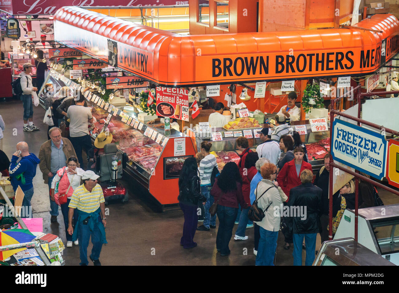 Toronto Canada,St. Lawrence Market,shopping shopper shoppers shop shops markets marketplace buying selling,retail store stores business businesses,ven Stock Photo