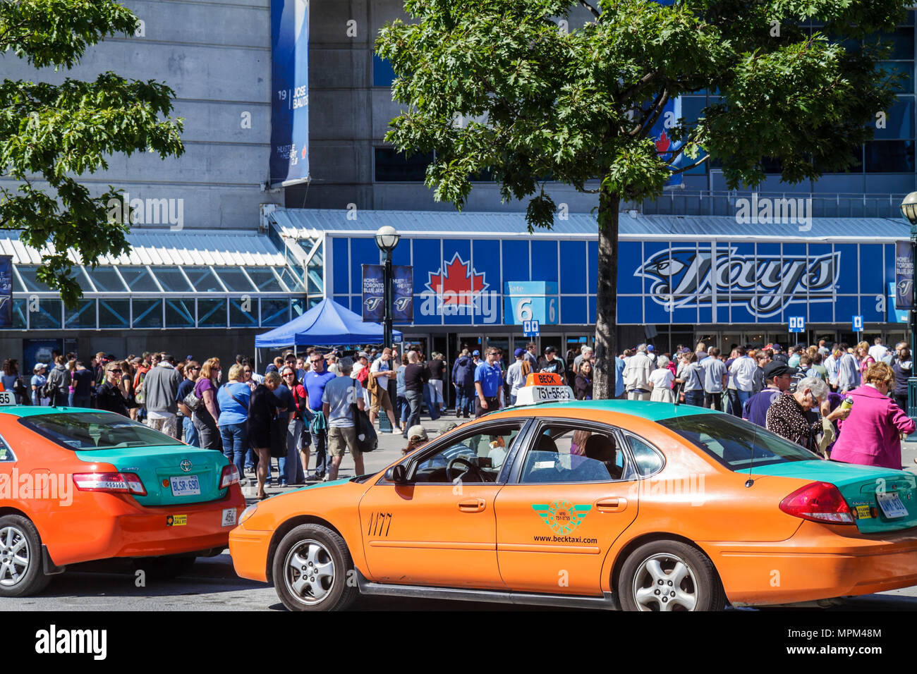 Toronto Canada,Bremner Boulevard,Rogers Centre,center,Blue Jays,Major League Baseball teamal sports,outside stadium,game day,arriving fans,taxi,taxis, Stock Photo
