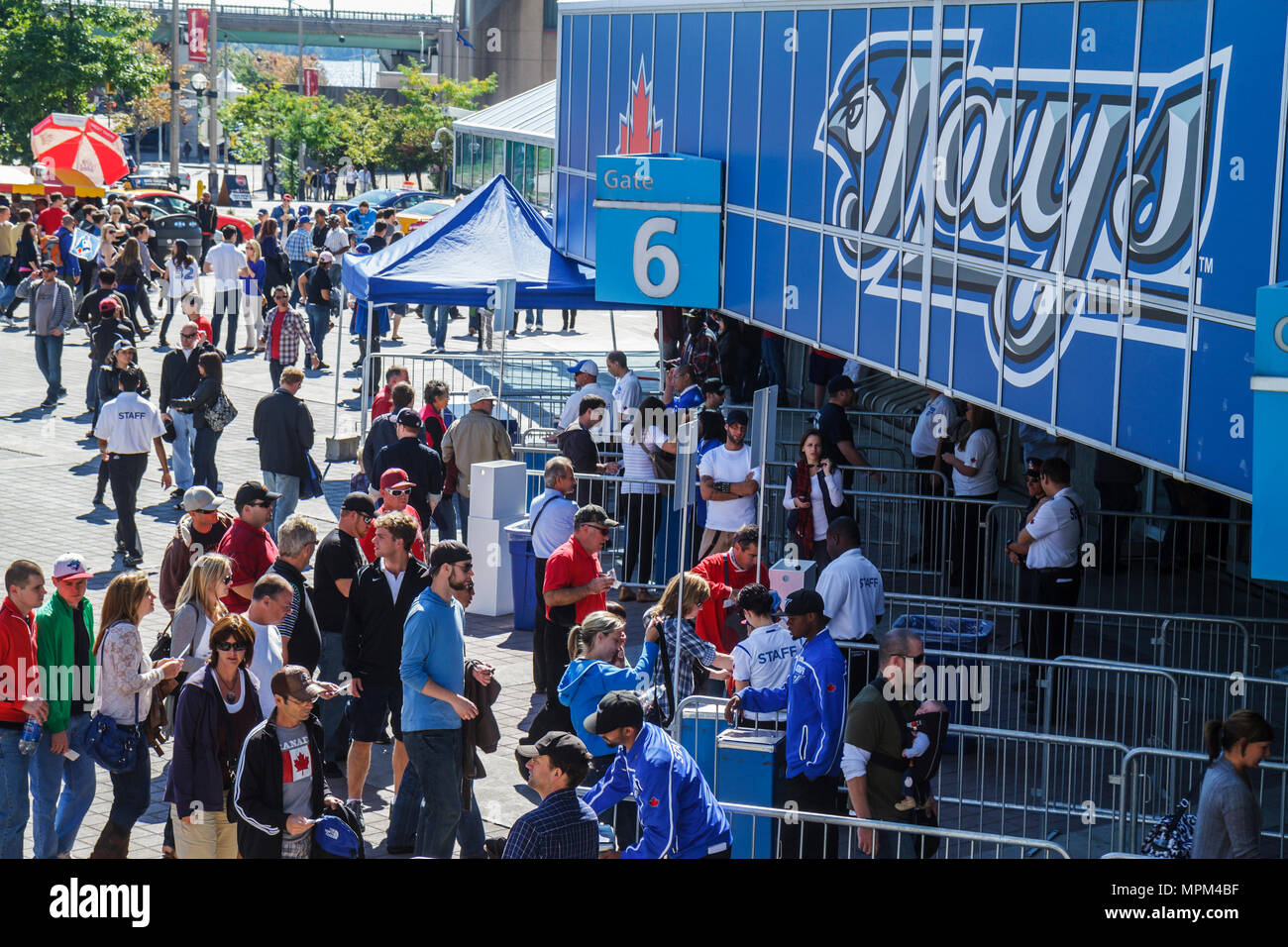 Toronto Canada,Bremner Boulevard,Rogers Centre,center,Blue Jays Major League Baseball teamal sports,outside stadium,game day,crowd,arriving fans,Gate Stock Photo