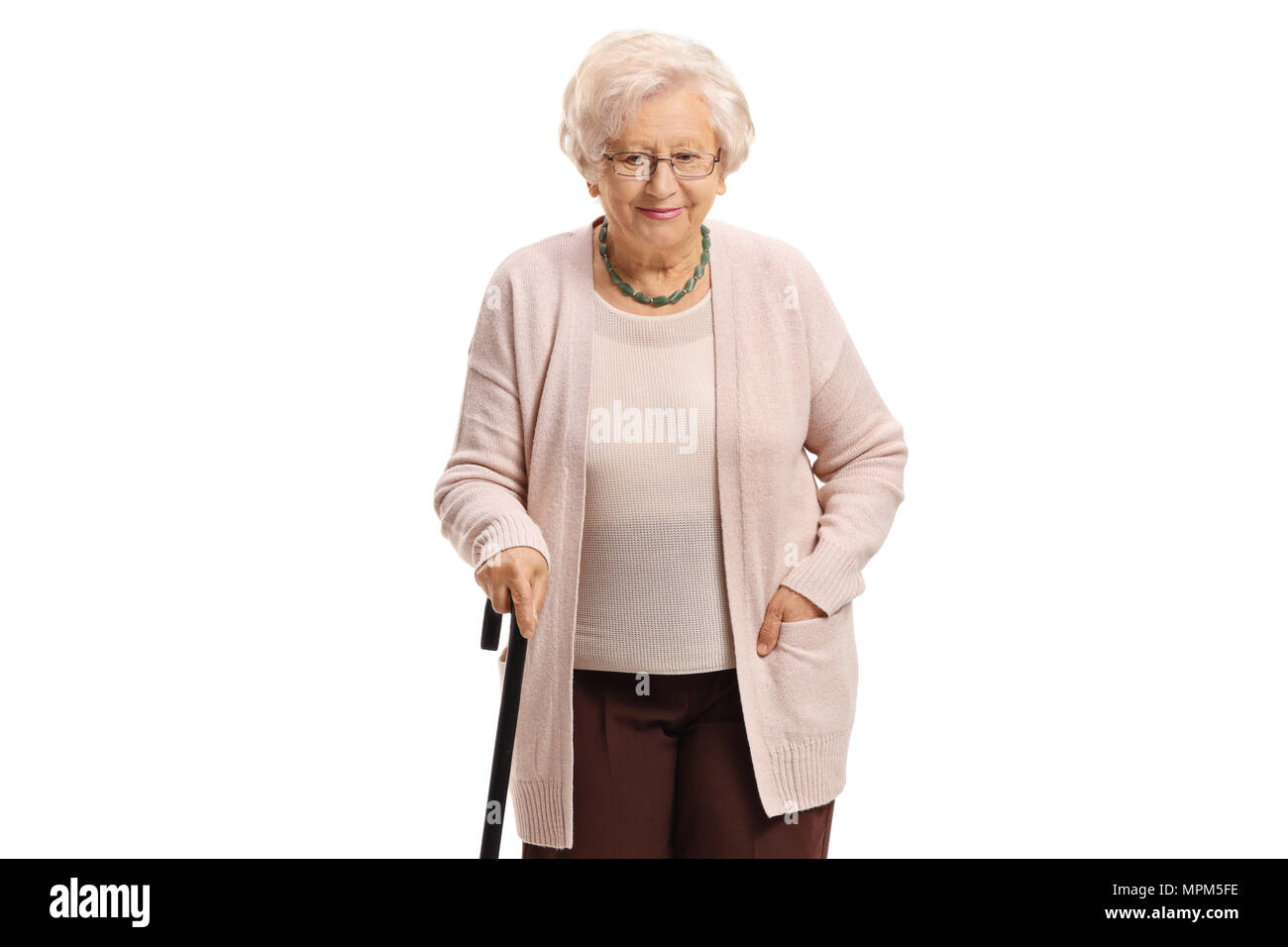 Elderly woman with a walking cane isolated on white background Stock Photo