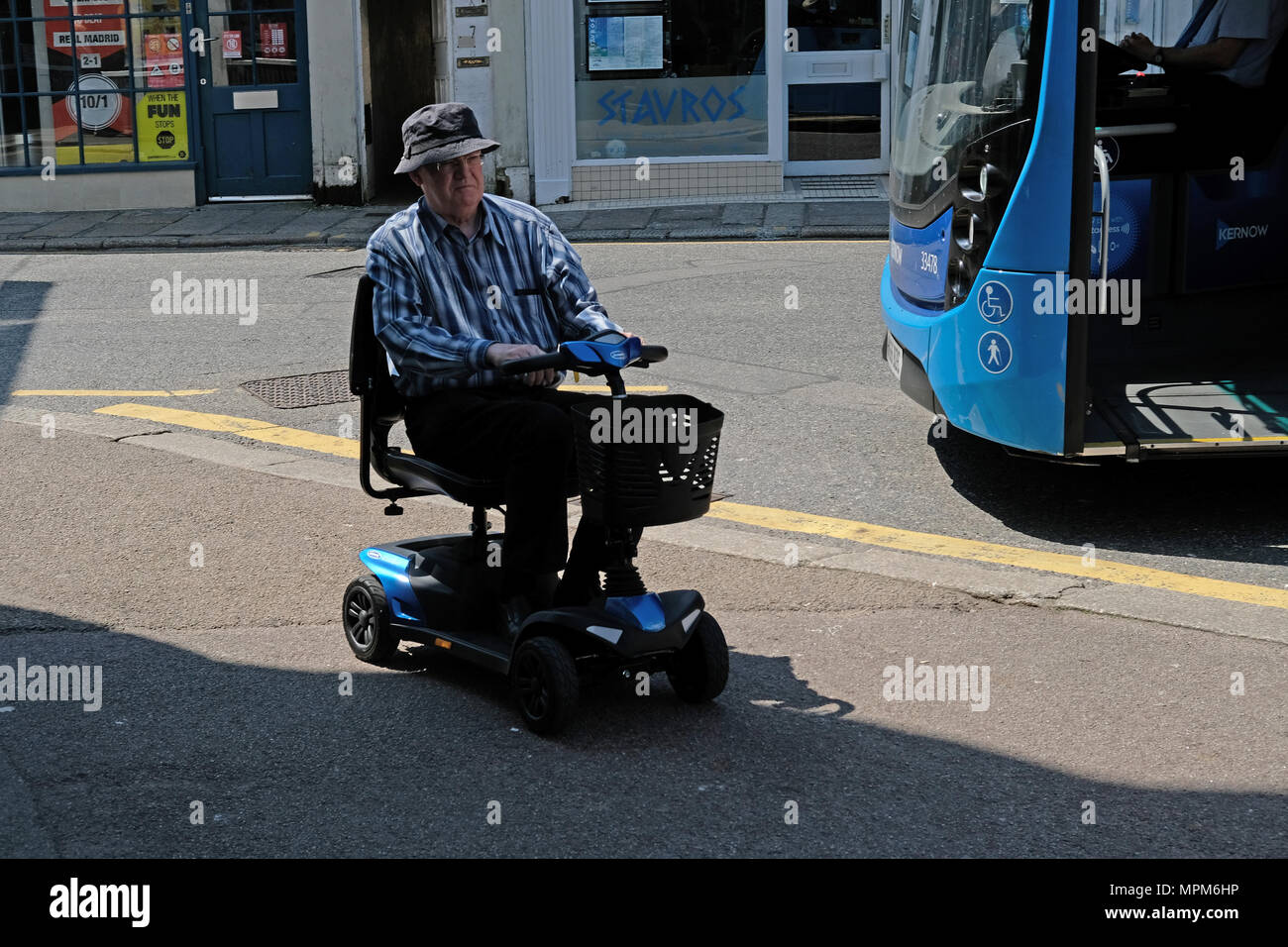 Riding mobility scooter hires stock photography and images Alamy