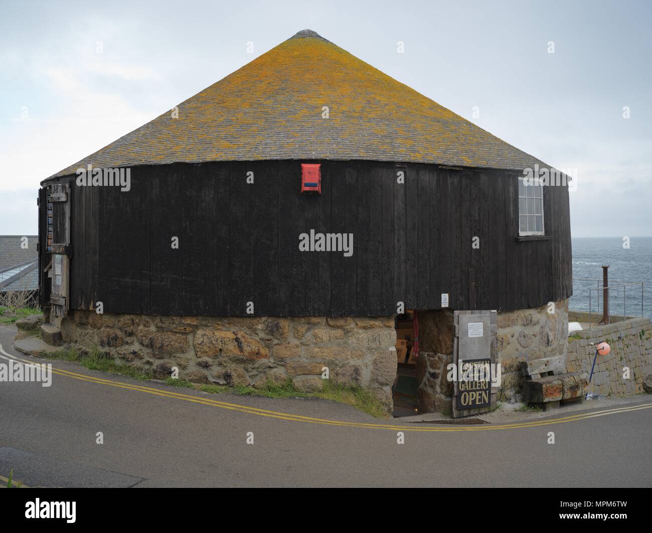 The Roundhouse in Sennen Cove which was historically used as a capstan house to winch boats up the slipway, but is now an art gallery Stock Photo